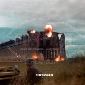 Luftwaffe ground crew demolishing old Zeppelin Hall in France 1942. Airfield was for the Jagdgeschwader 2 Richthofen.