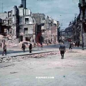 Luftwaffe officer Bindewald in destroyed bombed city town Krakow Poland 1940.