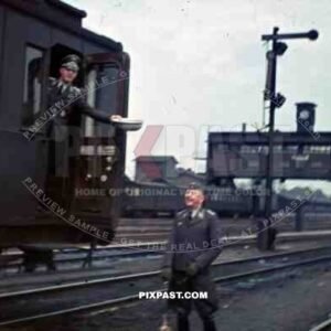 Luftwaffe officers empty train toilet at the railway yard in Stendal, Germany 1940