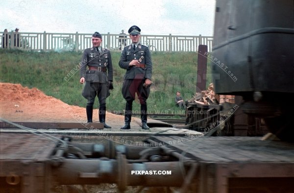 Luftwaffe officers smoking beside train transport. Smolensk Russia 1942. Luftlotte 2. Headquarters command. Bindewald