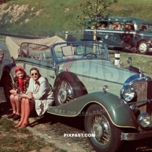 Mercedes-Benz 380 Cabriolet B, Kelheim Germany 1939, with tour bus behind and family resting beside road.