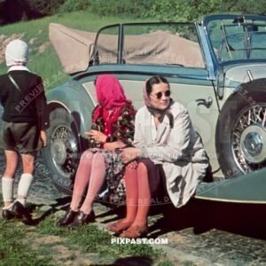 Mercedes-Benz 380 Cabriolet B, Kelheim Germany 1939, with tour bus behind and family resting beside road.