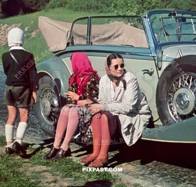 Mercedes-Benz 380 Cabriolet B, Kelheim Germany 1939, with tour bus behind and family resting beside road.