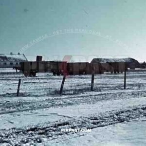 Military train wagon locomotive parked yard snow Poland 1940 winter