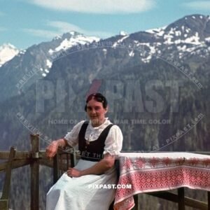 Mother in local Austrian Dirndl costume in Tyrol southern Austria 1939. Mountain restaurant.