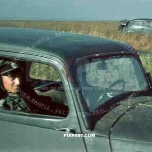 Officer of the 97. Jager-Division July 1942 Rostow Russia. being driven in his Opel Olympia staff car