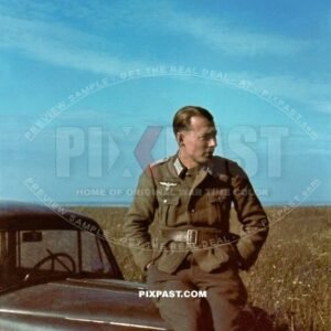 Officer of the 97. Jager-Division July 1942 Rostow Russia. being driven in his Opel Olympia staff car