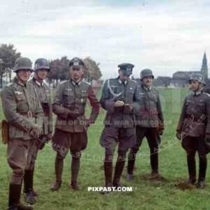 Officers in WW1 helmets inspecting infantry soldiers, Wendlingen, Germany, 1939. 14th Infantry Division.
