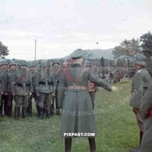 Officers in WW1 helmets inspecting infantry soldiers, Wendlingen, Germany, 1939. 14th Infantry Division.