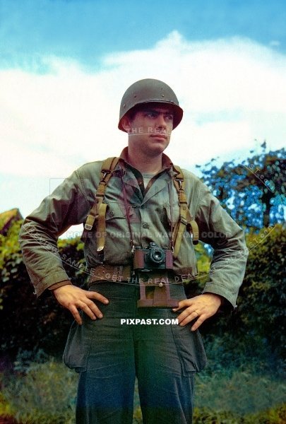 Official American Army war photographer with camera in Normandy France 1944 166th Signal Photo Company