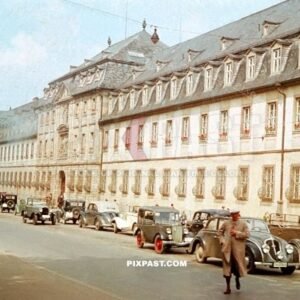 Old cars and bus parked in front of the Juliusspital Weingut Wurzburg Germany summer 1938