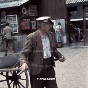 Old man pulling a cart in Mayrhofen, Austria 1941
