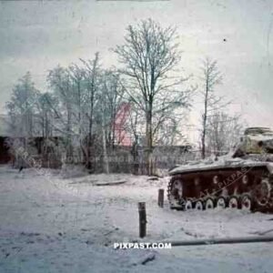 Panzer III equipped with the L42 50mm gun and winter white camo. Russian village. 207 Infantry Division. Russia 1942