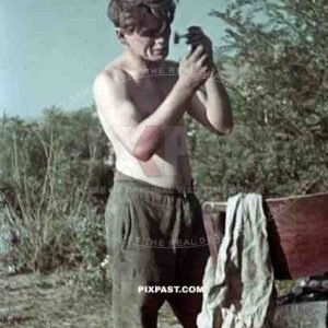 Panzer soldier shaving in Ukrainian Village, Krim, Kretsch, 1942, 22. Panzer Division.