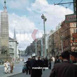 Parnell Square, Dublin, Ireland, 1953, Top of O Connell Street, Parnell Monument, old cars, shops, tourists,