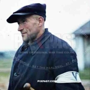 Polish Ghetto Guard in blue jacket. Armband with blue V. and police baton. Kriegsberichter Franz Krieger