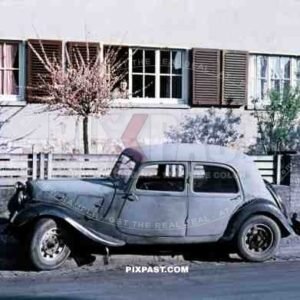 Pre- war captured Citroen Traction Avant 1938 car back in civilian usage in Munich, Germany 1946.