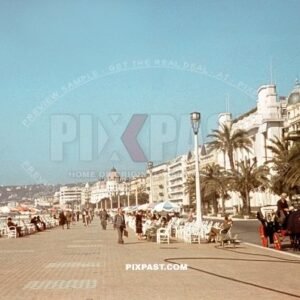 Promenade des Anglais in Nice, France Septmeber 1940. Civilian life with horse drawn wagon. Palmstreees