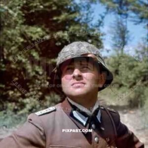 R.A.D. German War Reporter Kriegsberichter in South of France 1943. Wearing Camo Helmet with Chicken Wire.