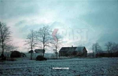 Russia Minsk, 1942, winter, snow Luftwaffe ground crew staff car beside Russian village,