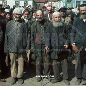 Russian Jewish civilians lined up in Chaltyr market square and photographed by a german soldier. Rostov Oblast Russia 1942