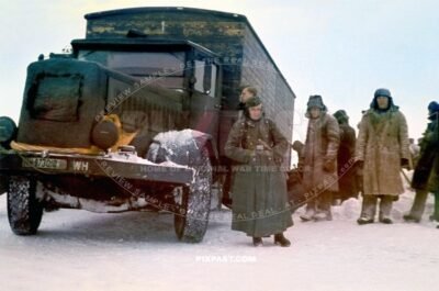 Russian POW prisioners digging MAN type F 4 heavy transport truck out of snow. Crimea Krim winter 1943