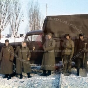 Russian POW soldiers digging snow from german army truck. Krimea Ukraine winter 1943.  6th Infantry Division Wehrmacht
