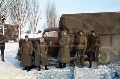 Russian POW soldiers digging snow from german army truck. Krimea Ukraine winter 1943. 6th Infantry Division Wehrmacht
