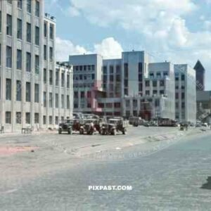 Russian captured truck park. Ulitsa Sovetskaya Street. Minsk, Belarus. 1941. Church of Saints Simon and Helena.