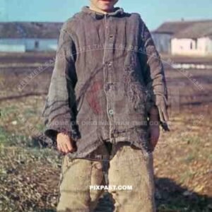 Russian farmer boy in traditional cloths photographed by German war reporter on the Russian Front 1943