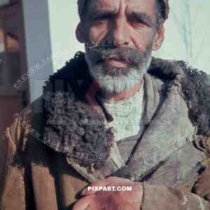 Russian farmer wearing local traditional winter cloths. Photographed by german war photographer Russia 1943.
