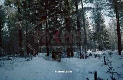 Russian forest, winter snow 1943 Russia, German infantry in white snow camo uniform and helmets, 207th Infantry Division