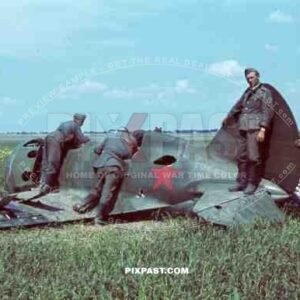 Shot down Russian fighter plane, Polikarpov monoplane, Inspected by German infantry. Summer 1941, Russia.