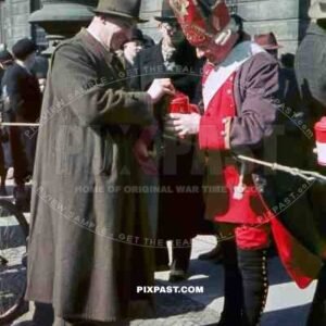 Soldier wearing period 1700 uniform. Collecting money for the Winterhilfswerk. Tag Der Wehrmacht. Zeughaus. Berlin 1940