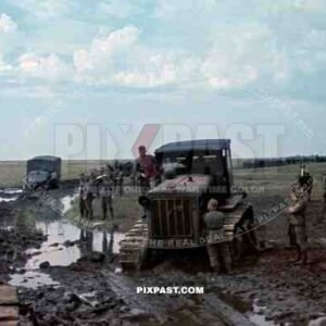 Soviet tractor S-65 used to pull out Wehrmacht trucks out of the mud, September 1941. Poltava, Donez, Ukraine.