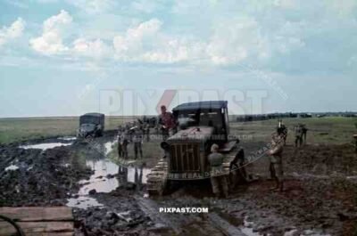 Soviet tractor S-65 used to pull out Wehrmacht trucks out of the mud, September 1941. Poltava, Donez, Ukraine.