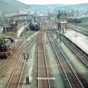 Steam Locomotive transporting cargo in the Train Station Bahnhof Marburg/Lahn. 1940