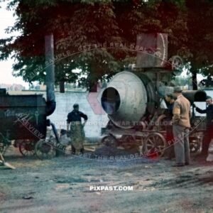 Steam powered Cement mixer on road construction in Poland 1941. Using local polish and Russian slave labor