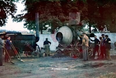 Steam powered Cement mixer on road construction in Poland 1941. Using local polish and Russian slave labor