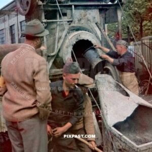 Steam powered Cement mixer on road construction in Poland 1941. Using local polish and Russian slave labor
