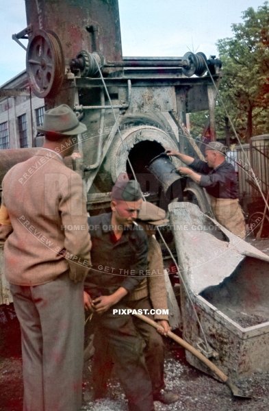 Steam powered Cement mixer on road construction in Poland 1941. Using local polish and Russian slave labor
