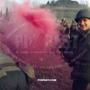 The Blue Devils US 88th Infantry Division training with smoke grenades in Italy 1944. GI holding his captured German helmet
