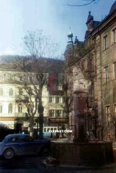 The Lions Well Lowenbrunnen fountain in Universitatsplatz in front of the Old University Heidelberg Baden Wurttemberg 1945