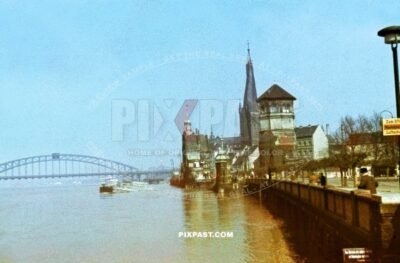 The Rhine bridge in Dusseldorf in west Germany NRW. Germany 1942. Luftschutz bunker yellow sign.  Schlossturm.