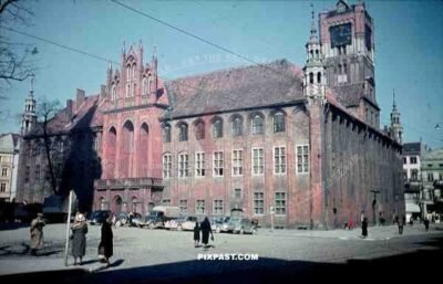 Town Hall Rathaus in Torun Poland 1939. German army trucks and cars.