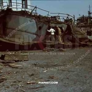 Tripoli harbour in Libya, 1942. Destroyed Burning german transport ships after Allied air attack.