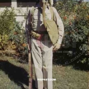 U.S. Army Infantryman in Florida USA 1942 wearing Brodie helmet, Gas Mask and M1 Garand semi-automatic rifle