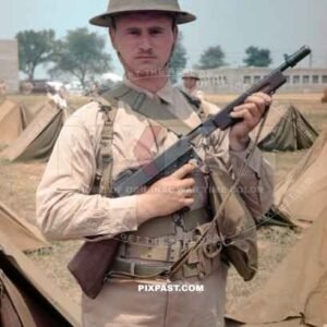 US Infantry GI wearing a Dough Boy Style M1917 Helmet and Tommy Gun. California USA 1938