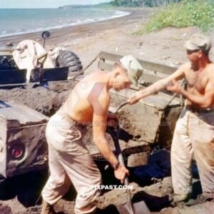 US soldiers digging sand into a Dodge M37   4×4 Pickup Truck. Philippines 1945. Thirteenth Expeditionary Air Force 13 EAF