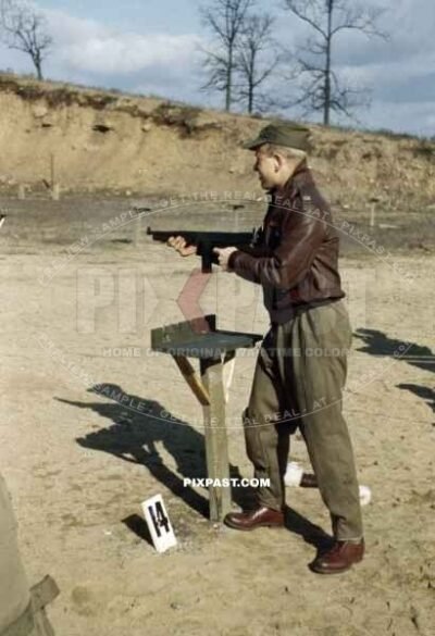 USAAF pilot trains with Thompson submachine gun in MacDill Field, Florida 1942. 322nd Bombardment Squadron Medium.
